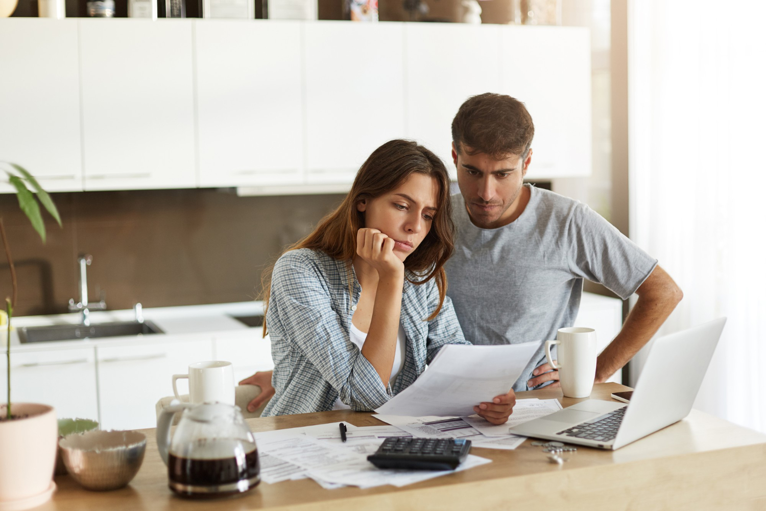 A couple learning How to Apply for a Personal Loan.