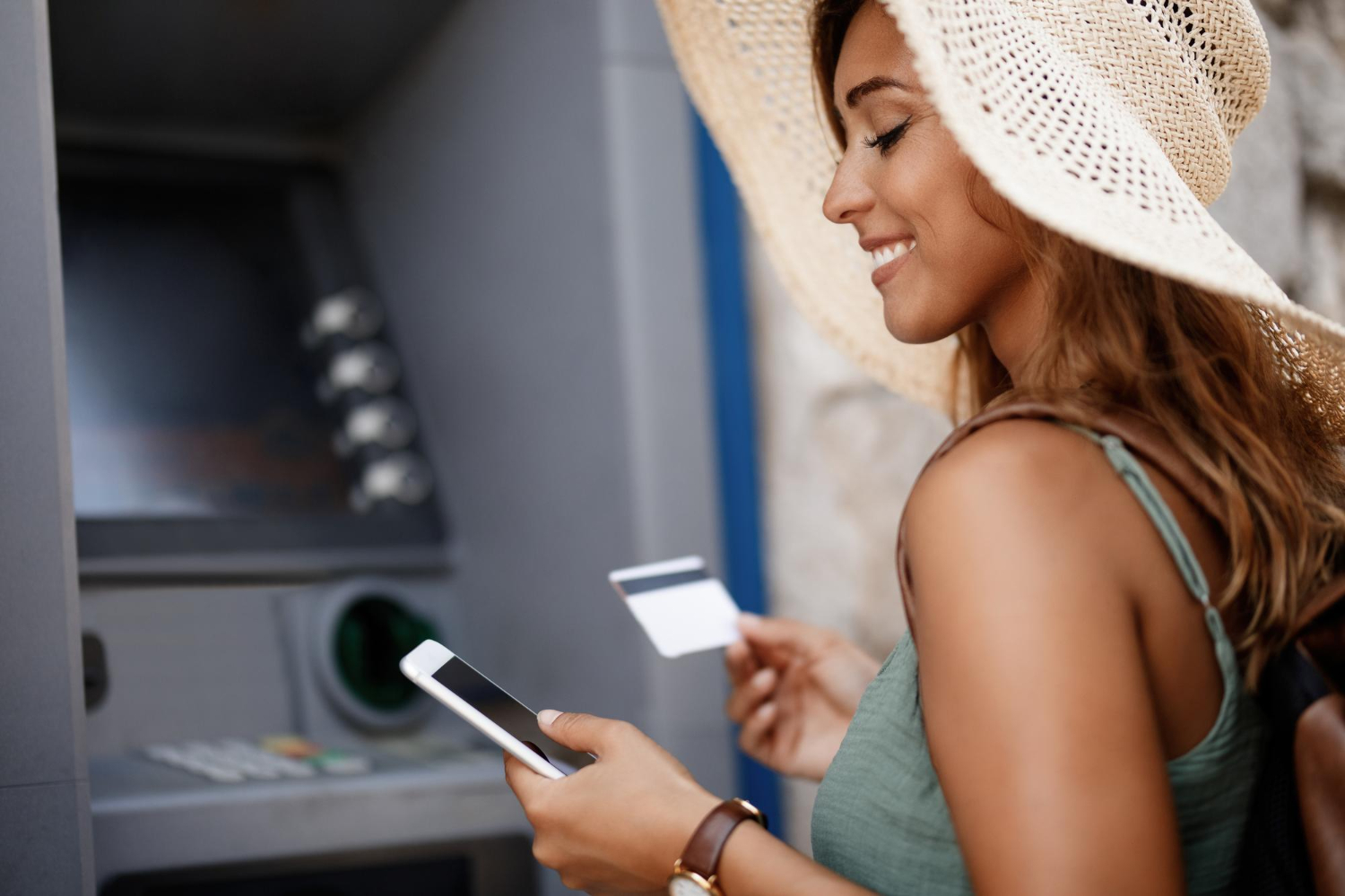 Woman in a bank opening a savings account.