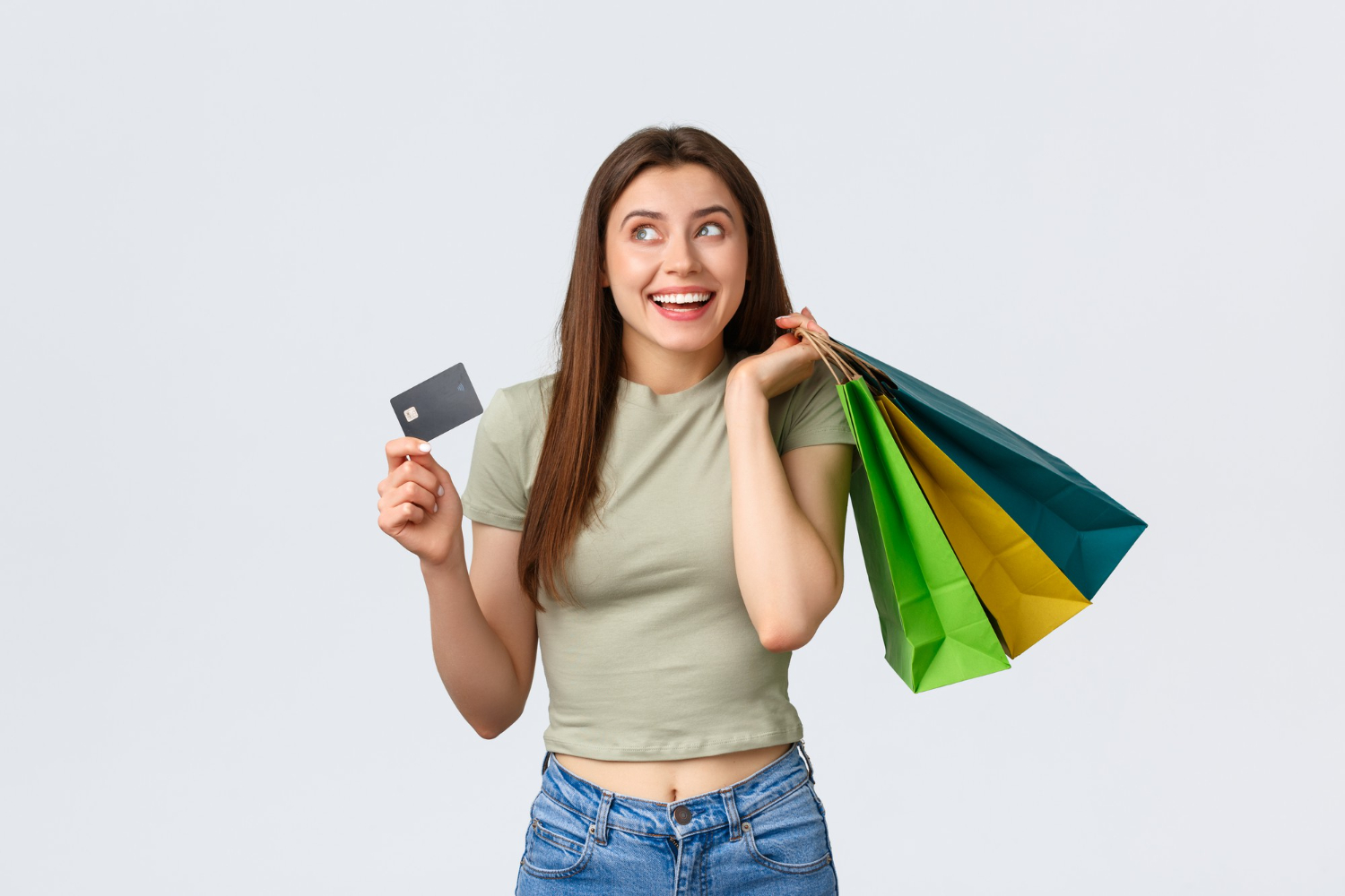 Woman happy while shopping after find out about the credit card fees.