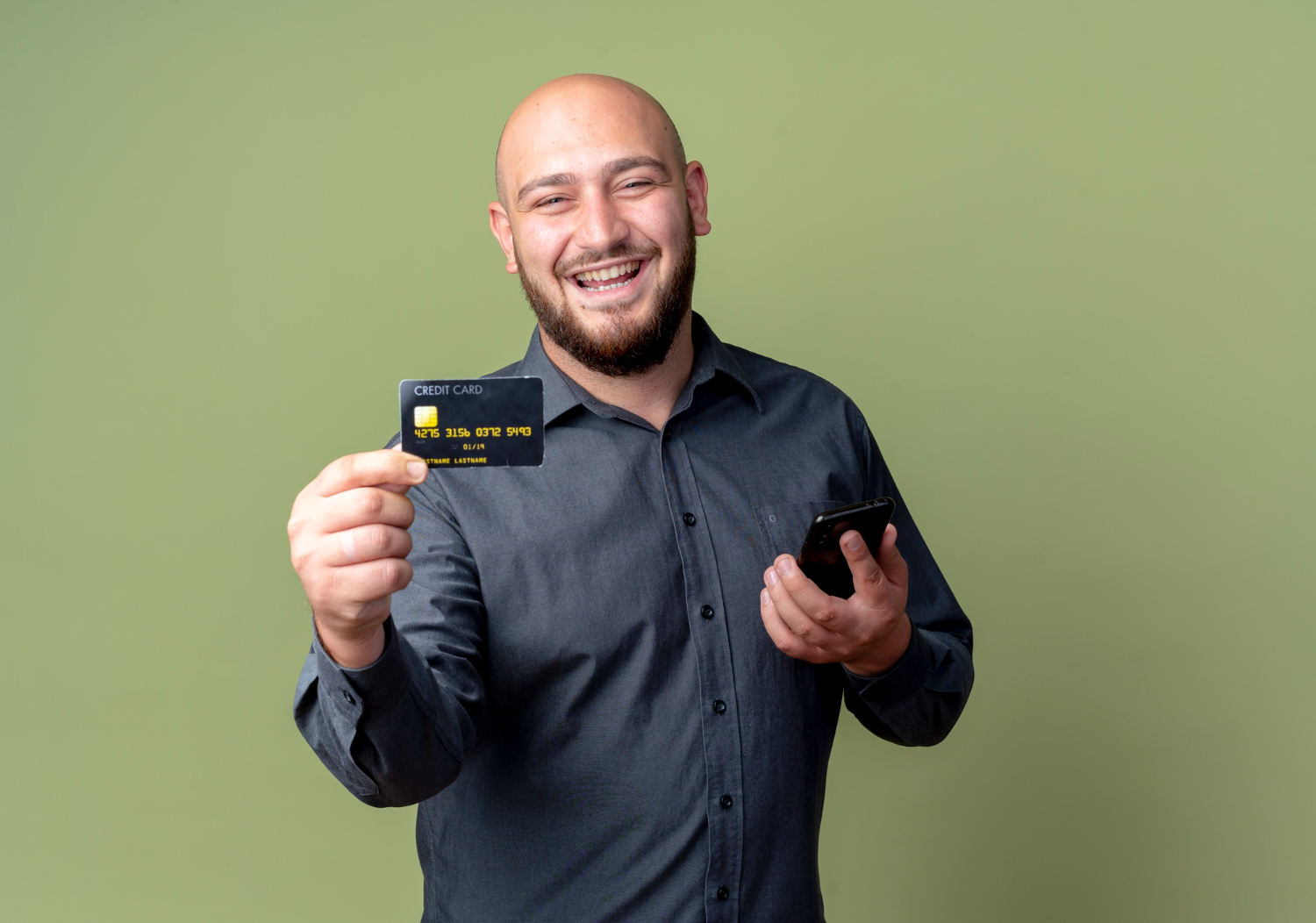 A man holding his GM Business Card.