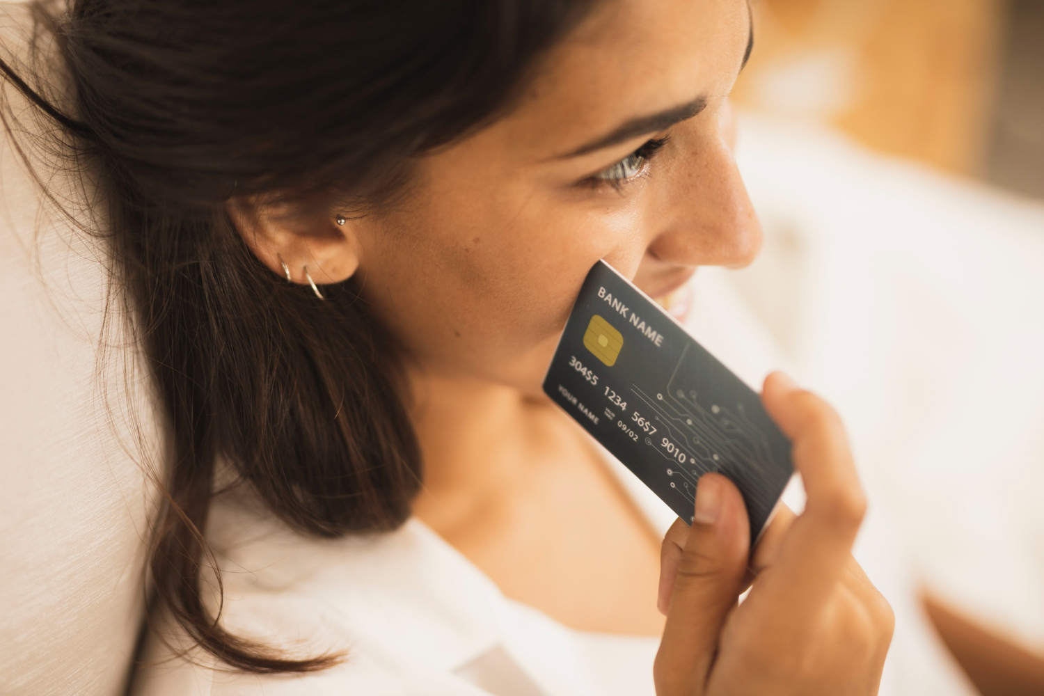 Woman holding her Southwest Rapid Rewards.