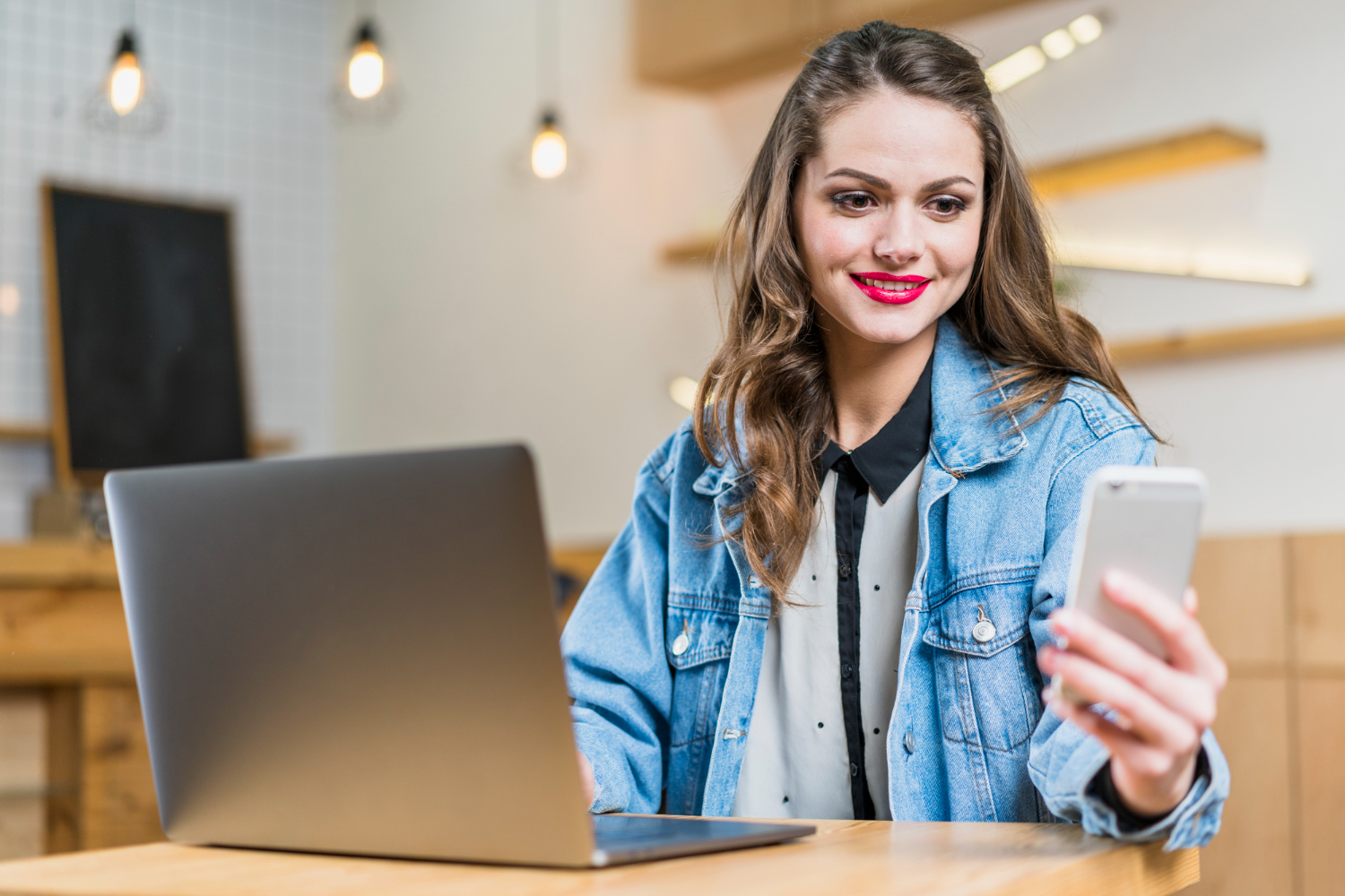 Woman doing a Wire Transfer with her smartphone.