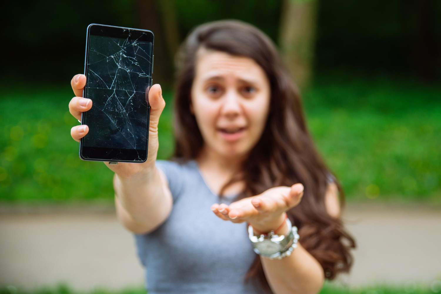 woman takes out insurance for broken cell phone