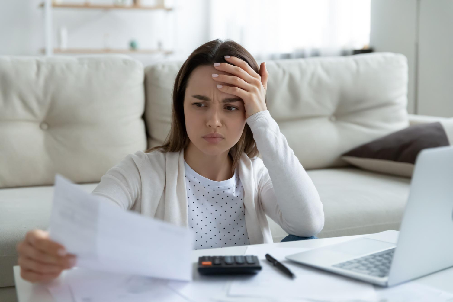 Woman learning about Debt Payment Methods.