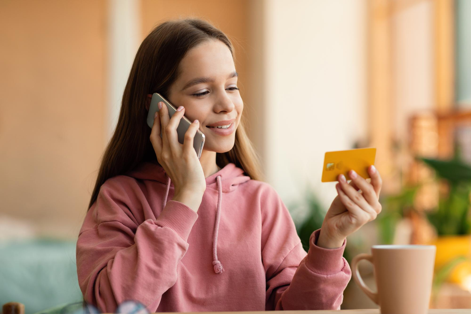 Woman learning about credit card refunds.