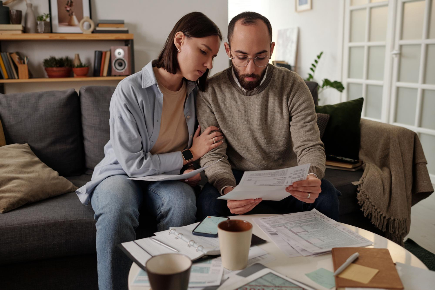 a couple learning How to buy a house with bad credit.