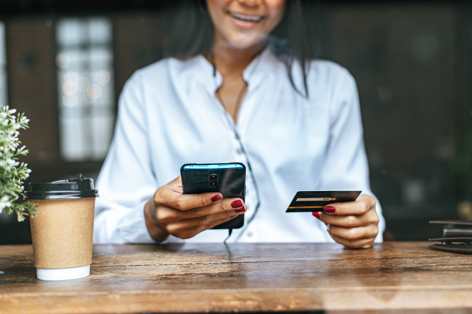 woman using Balance Transfer to pay debts.