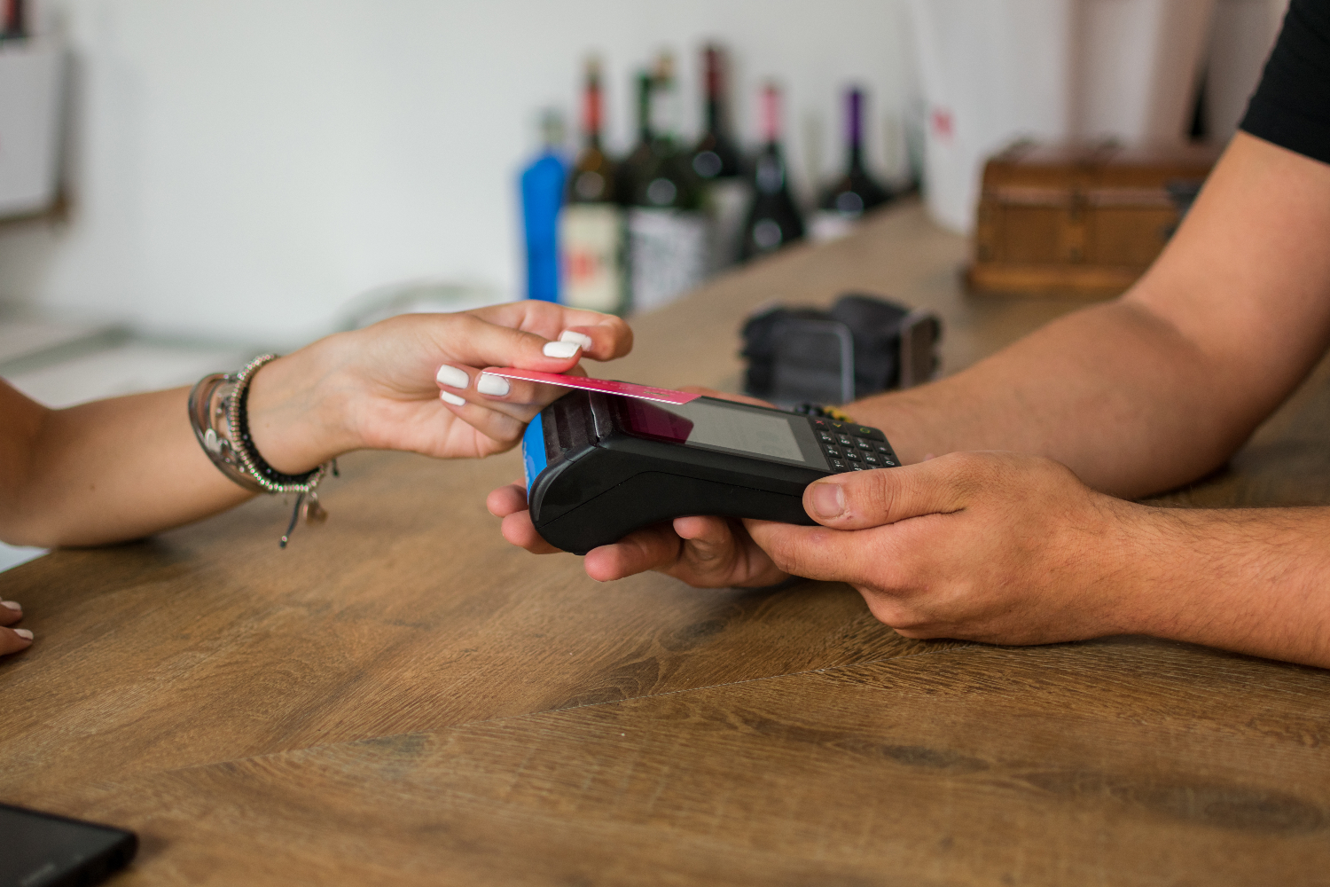 woman using store credit card.