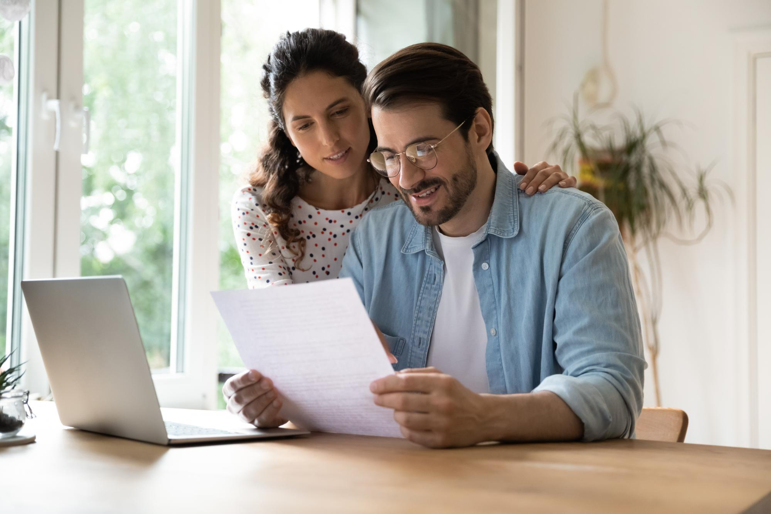 A couple getting a Personal Loan with Low Interest Rates.