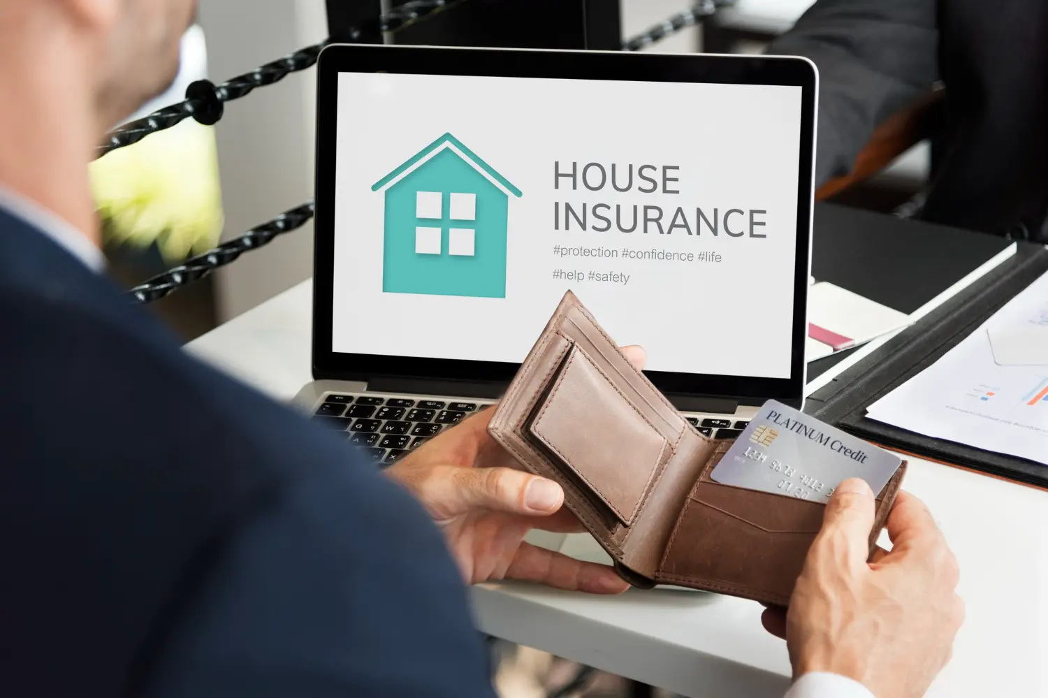 A man learning about Climate Risk in Home Insurance Pricing.