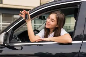 A girl enjoying Teen Driver Insurance Discounts.