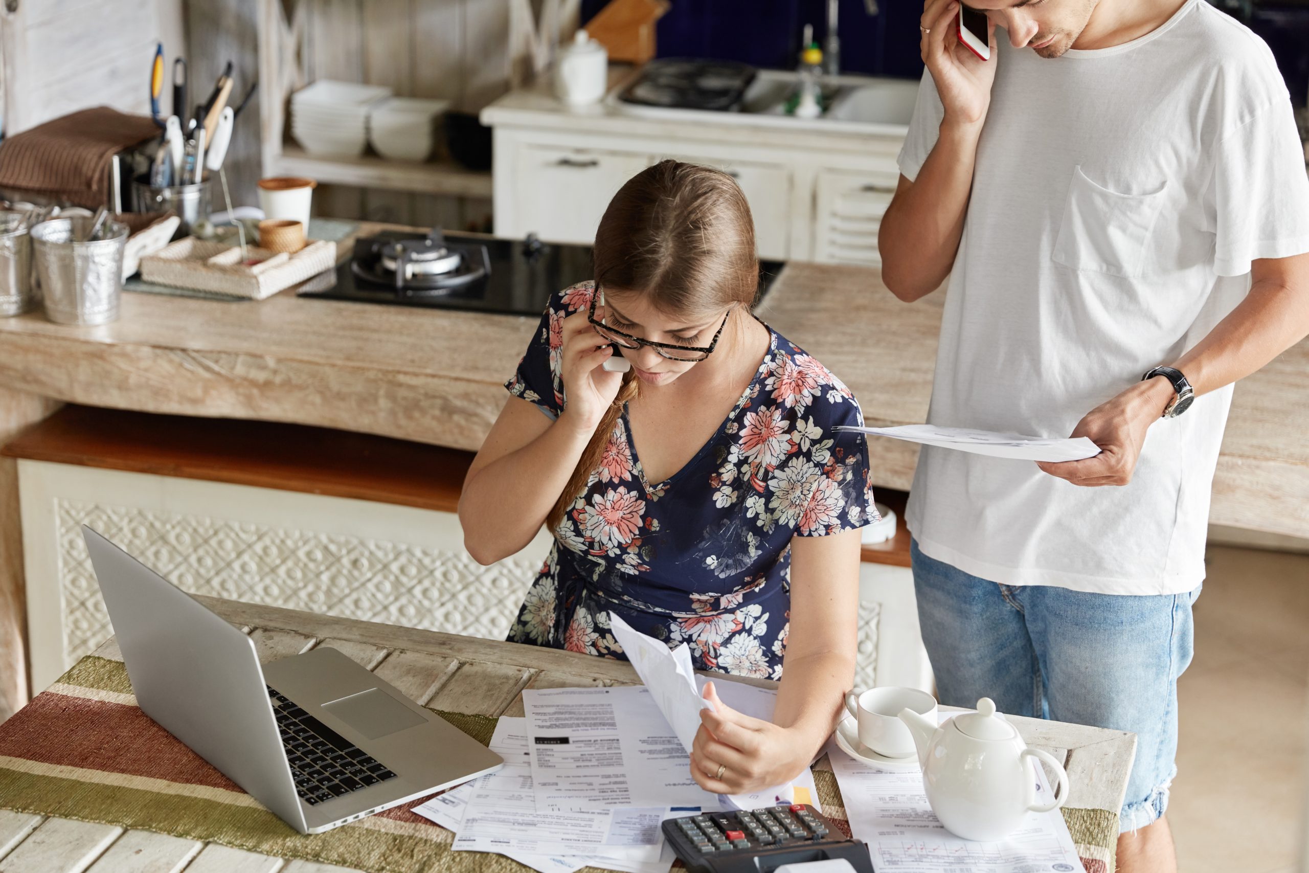 Homeowners comparing actual cash value and replacement cost insurance options